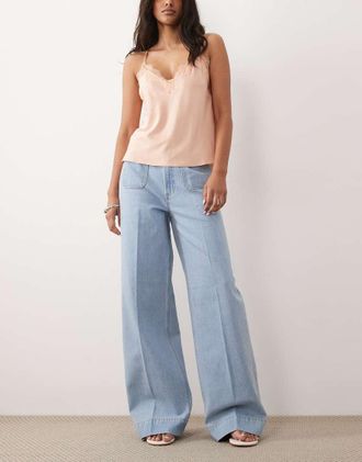 Asos Jeans a vita alta con fondo ampio lavaggio chiaro con tasche sul davanti-Blu