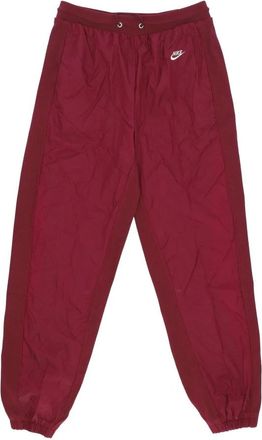 Nike Winterized Sportswear Lined Trainingsbroek - Heren - Trainingsbroeken - Rood - XL - Nylon - Fitness