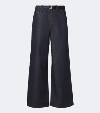 sacai Jeans anchos con cintur&oacute;n