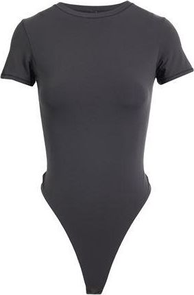 SKIMS CAMISETAS Y TOPS - Bodies en YOOX.COM