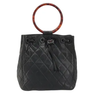 Chanel Vintage Resin Handle Drawstring Bucket Bag Quilted Lambskin Black Leather Handbag (Pre-Owned)
