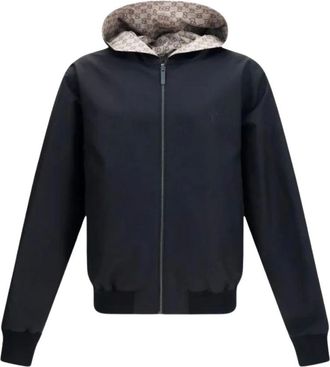 Gucci Omkeerbare capuchonjas van katoen en GG-nylon - Heren - Jassen - Zwart - Maat: 2XL Katoen