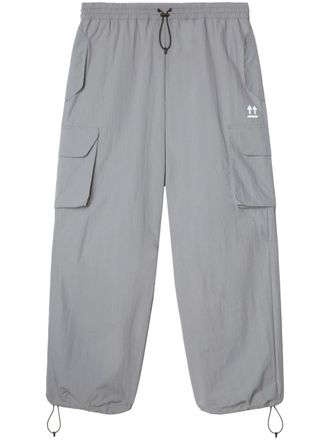 Off-white logo-embellished parachute pants - women - Polyamide - 38 - Grey