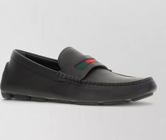 Gucci leather driver loafers rubber sole detailing