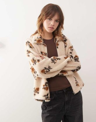 Monki Giacca in pile beige a fiori con zip-Bianco