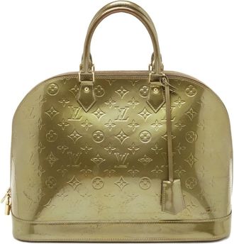 Louis Vuitton Alma GM leren shopper met monogram - Goud