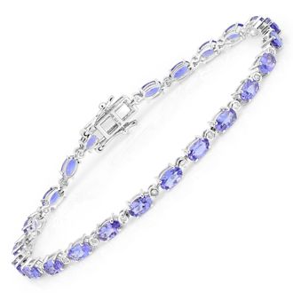 Diana M. Jewels Tanzanite ( AA+ ) Oval 5x3mm - 24Pcs + White Diamond F/C Round 1.20mm( I1-I2/I color ) - 24Pcs ( Box Lock With Double Safety )