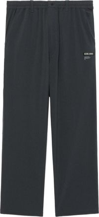 Izzue logo-appliquéd trousers - men - Spandex/Elastane/Polyester - 34 - Grey