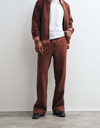 Rains 41030 Downtime - Joggers in maglia bordeaux con coulisse e logo in coordinato-Rosso