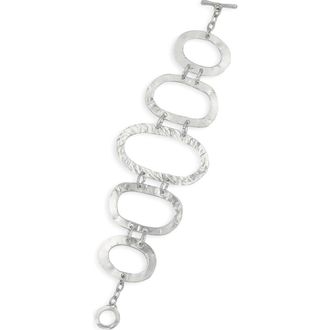 Karine Sultan Hammered Oval Link Toggle Bracelet in Silver at Nordstrom Rack