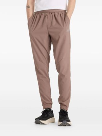 New Balance Pantaloni sportivi AC - Marrone