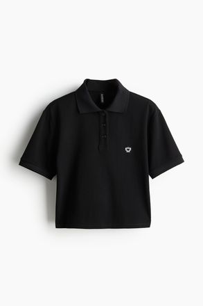 H&M Kurzes Poloshirt aus Pikee - Schwarz