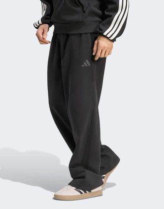 adidas adidas Performance - Pantaloni ampi neri con logo piccolo-Nero