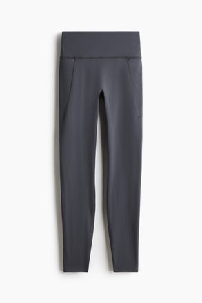 H&M Sportleggings mit SoftMove und Taschendetail - Grau