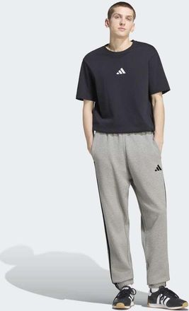 adidas adidas Performance - Essentials - Pantaloni affusolati in spugna grigio m&eacute;lange medio con 3 strisce e polsini elasticizzati bianchi