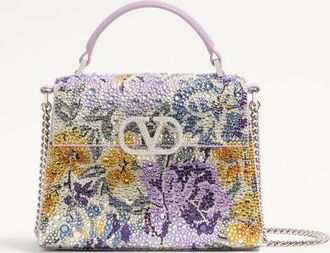 Valentino Garavani Valentino Garavani mini Vsling handbag with Flowerism rhinestone motif and jewel logo Wo