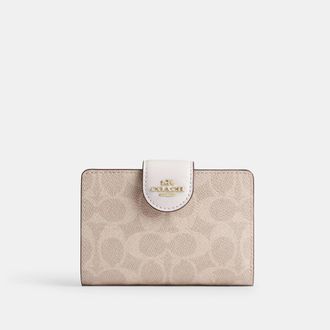 Coach Medium Corner Zip Wallet In Signature Canvas