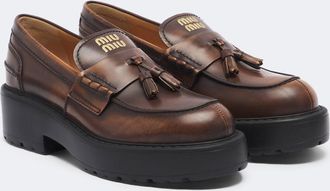 Miu Miu Mocasines con plataforma de piel