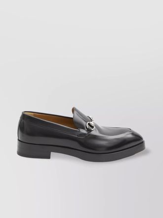 Gucci metal buckle pointed loafers with leather sole