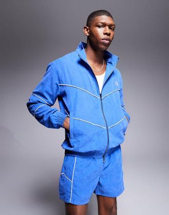 Alma de Ace Alma de Ace - Giacca sportiva blu con logo in coordinato