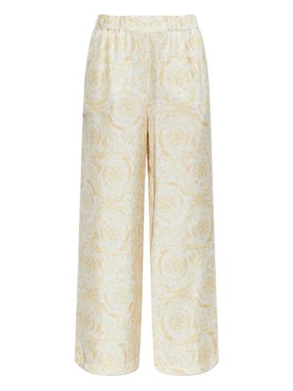 Versace floral-patterned trousers - women - Silk - 38 - White