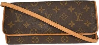Louis Vuitton Pre-owned Clutches, female, Brown, Size: ONE SIZE Pre-owned Canvas Clutch