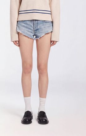 Balenciaga Shorts in denim distressed slim fit a vita media con orlo a taglio vivo