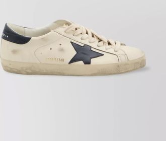 Golden Goose distressed leather sneakers with shiny blue accents