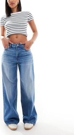 Calvin Klein Jeans Jeans baggy a vita bassa lavaggio blu medio