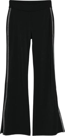 Michael Kors logo-tape flared trousers - women - Nylon/Elastane - S - Black