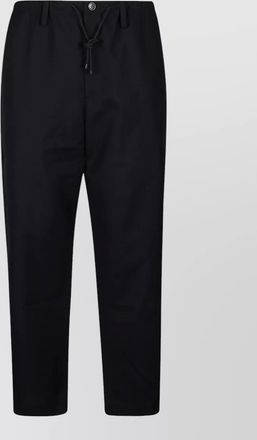 Dries Van Noten wool trousers with button detail and elastic waistband