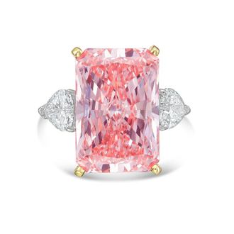 Diana M. Jewels 18kt Yellow gold Lab grown 12ct Fancy pink radiant diamond ring with heart diamonds on the side and micropave band