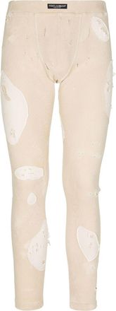 Dolce & Gabbana distressed skinny-cut jeans - men - Cotton/Elastane - 48 - Neutrals