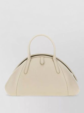 Alaia leather tote bag curved handle tag