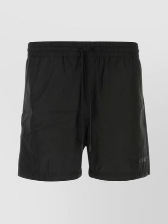 Gucci polyester swim shorts with elastic waistband and back pocket