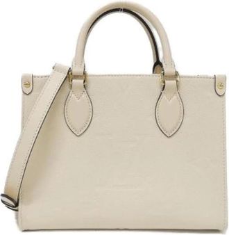Louis Vuitton Pre-owned On The Go Monogram Empreinte Leder Tas - Dames - Vintage Handtas - Beige - ONE Size - Leer - Vintage