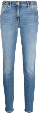 Versace low-rise Medusa Head-motif skinny jeans - women - Cotton/Cotton/Spandex/Elastane/Polyester/Calf Leather - 26 - Blue