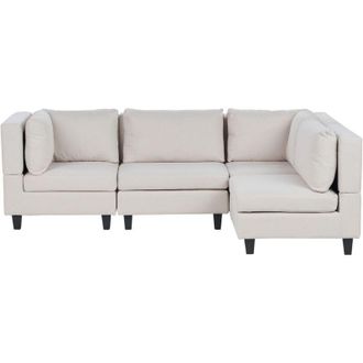 Beliani Divano componibile a 4 posti imbottito in tessuto beige chiaro gambe nere lato sinistro Unstad