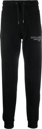 Karl Lagerfeld embossed-logo track pants - men - Cotton/Polyester/Cotton - M - Black