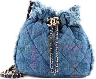 Chanel Denim Mood Chain Logo Printed Quilted Fringe Denim Medium bucket bag - Blauw