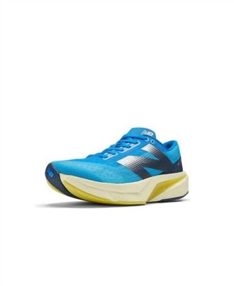 New Balance Women Fuelcell Rebel V4 Running Shoes In Spice Blue/limelight/blue Oasis