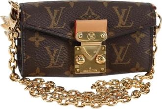 Louis Vuitton Pre-owned Mini Bags, female, Brown, Size: ONE SIZE Pre-owned Monogram Canvas Pouch