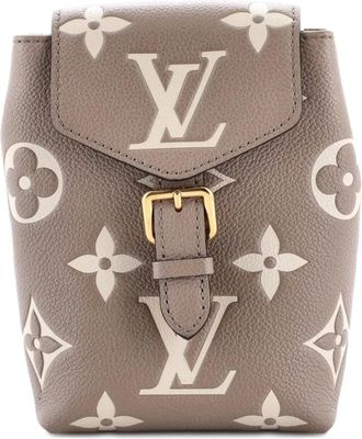 Louis Vuitton Tiny Bicolor Monogram Empreinte Giant backpack - Beige