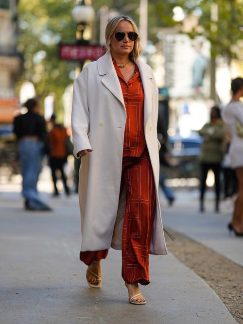Light beige wool coat worn with matching set and heels