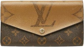 Louis Vuitton Pre-owned Wallets, female, Brown, Size: ONE SIZE Pre-owned Monogram Giant Reverse Portefeuille Sarah Long Wallet
