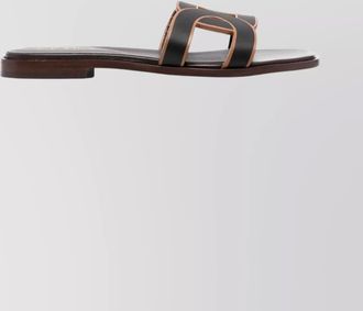 Tod's mules with contrast trim and flat sole