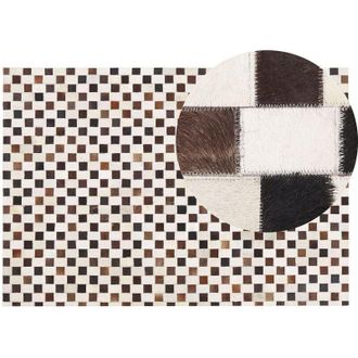 Beliani Rug KAYABEY Beige 140 x 200 cm Leather