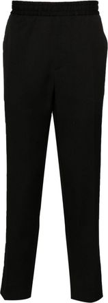 Golden Goose logo-plaque virgin wool trousers - men - Virgin Wool/Cotton - 50 - Black