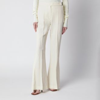 Sportmax Low-rise flare trousers in viscose and textile paper