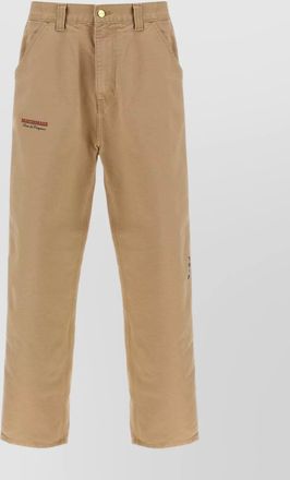 Carhartt Work in Progress graphic design trousers featuring pockets